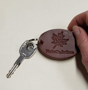 Maple Leaf Keychain with key attached