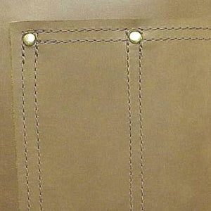 Heay-duty, long leather pocketed shop apron with an adjustable strap that goes over your head, rests on your neck. The edges are turned and sewn with secure nylon thread and includes a leather thong tie at the waist. Size: 38" x 24.5"