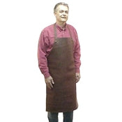 Basic heavy-duty long leather shop apron, around the head adjustable strap. Secured at the waist with a leather thong tie with grommets. Size: 38" L x 24.5" W