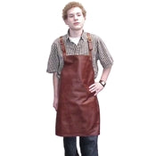 Cross-back adjustable straps leather apron, edges are turned and sewn, leather thong tie at the waist. Size 28" x 24.5"
