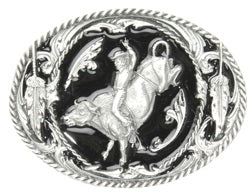 An exquisitely designed image of a bull rider surrounded by two feathers and lassoed by a rope around the outside of the buckle.  This beautiful antiqued buckle is made of fully cast metal by Siskiyou. Made in the USA, dated 1995.  The back of the buckle is designed and features 2 cow heads with horns. 